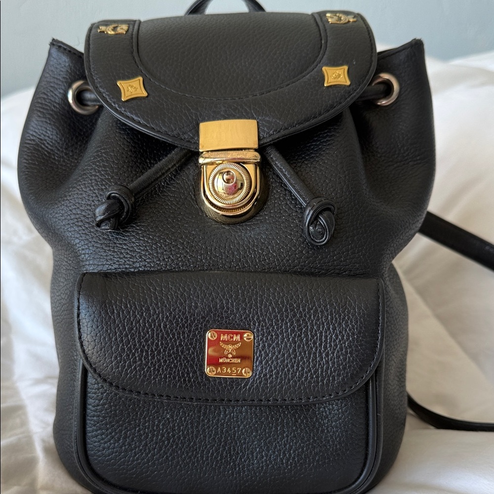 MCM Visetos Mini Black and Gold Leather Backpack